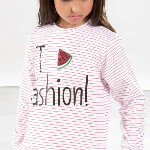 Maglia a manica lunga in felpina rigata con stampa, applicazione in paillettes e balza sul fondo